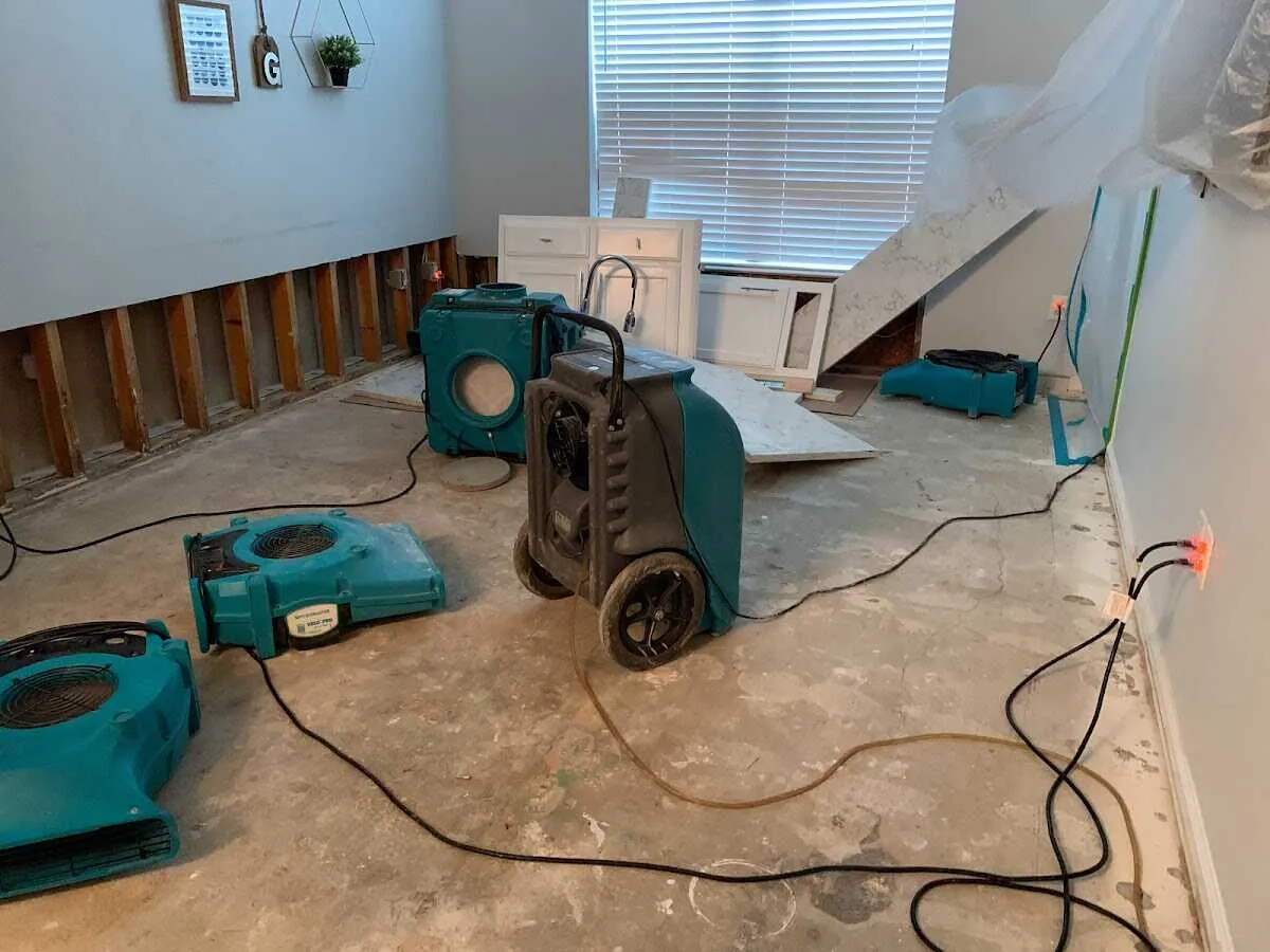 Dehumidifier in flood-cut room for Water Damage Restoration in Green Brook